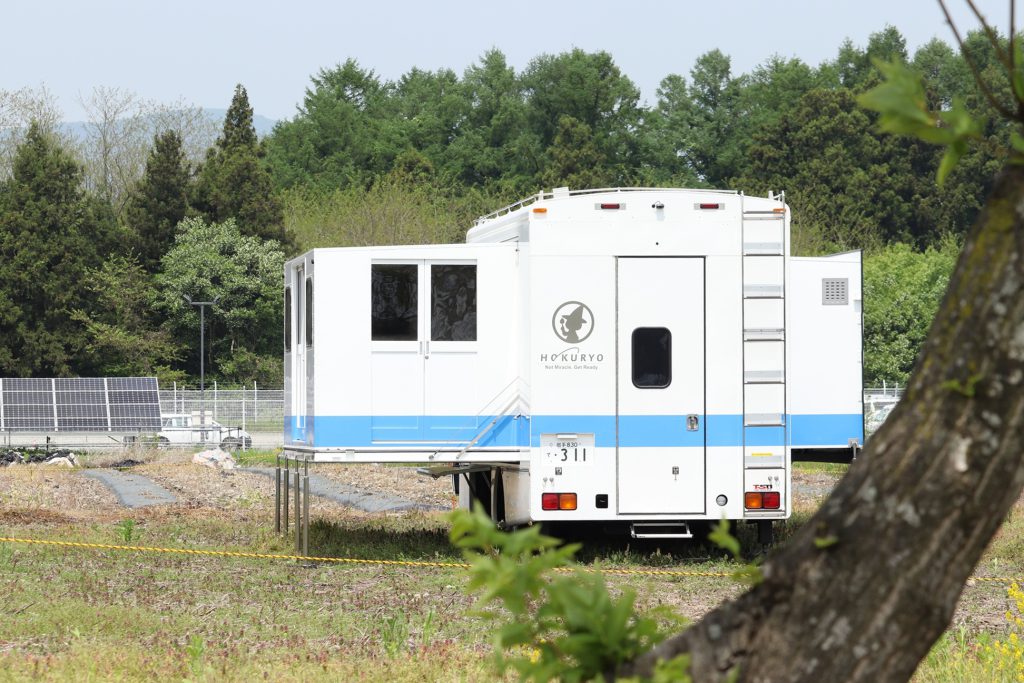 動く災害対策本部の後方